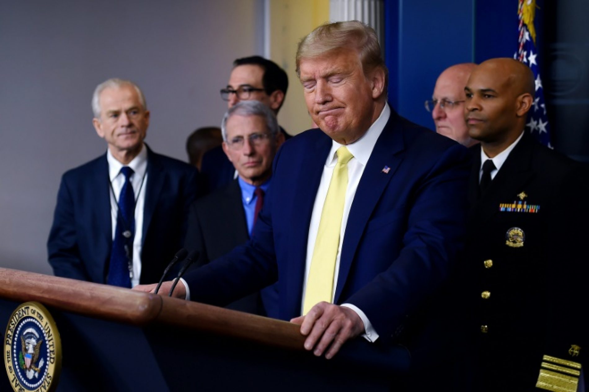 Trump feels the heat as coronavirus stalks US